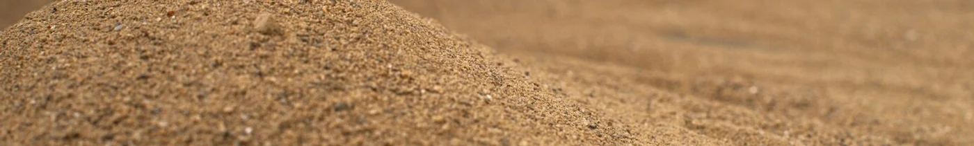 c7458fa6-97e2-4b39-b0d2-c46bc8371dff-brown-sand-surface-black-wall_179666-37340.jpg